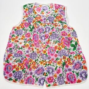 Vintage floral print cobbler apron with a snap front